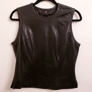 Cynthia Rowley sleeveless leather top with matching mini skirt.